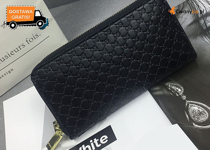 Elegancki portfel damski w stylu Gucci. Tłoczone wzory oraz elementy w kolorze złota nadają mu nie powtarzalny wygląd