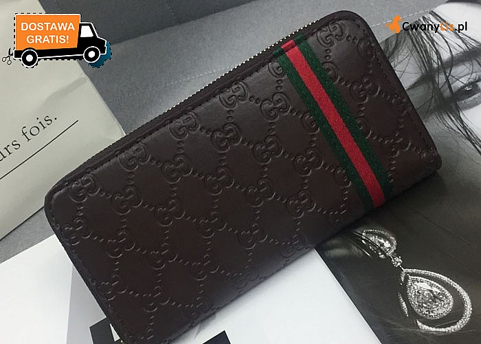 Elegancki portfel damski w stylu Gucci. Tłoczone wzory oraz elementy w kolorze złota nadają mu nie powtarzalny wygląd